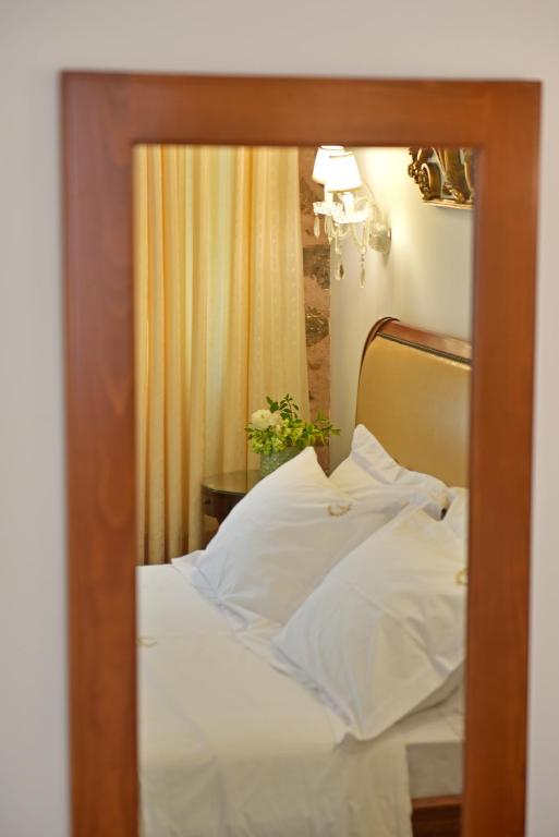 Letto o letti in una camera di Hotel Sophia