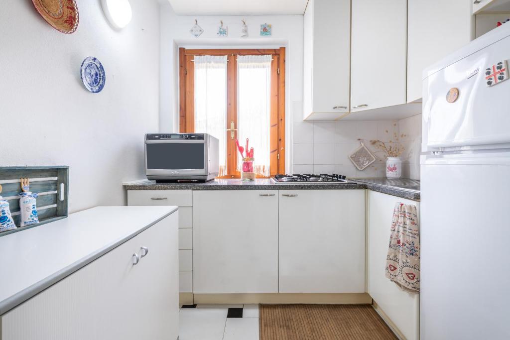 Kuchnia lub aneks kuchenny w obiekcie La Casa di Silvia