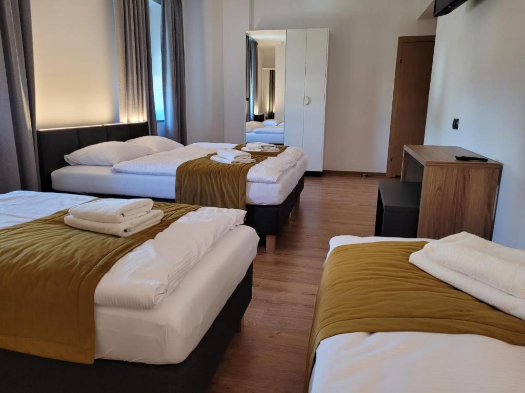 Posteľ alebo postele v izbe v ubytovaní Good Sleep