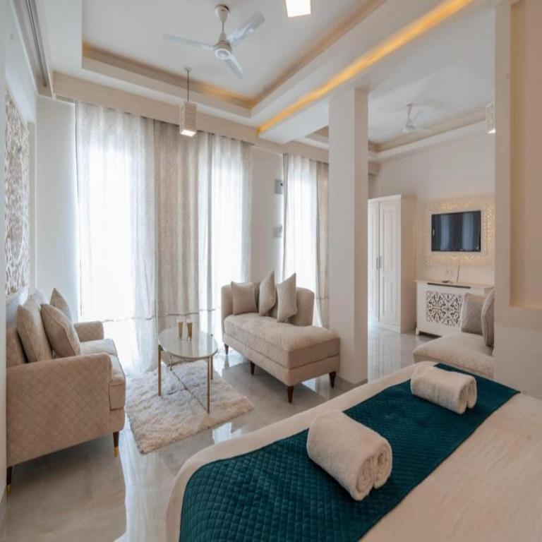 Postel nebo postele na pokoji v ubytování Lillywoods Zac Beach Resort, Calangute