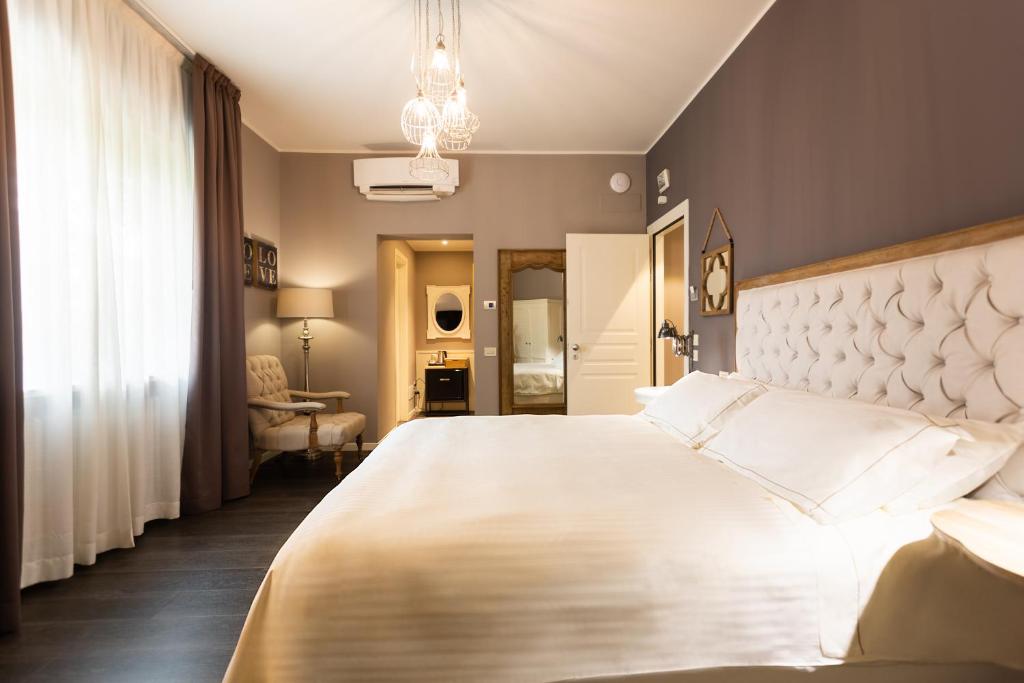 Postel nebo postele na pokoji v ubytování Like Home Boutique Hotel