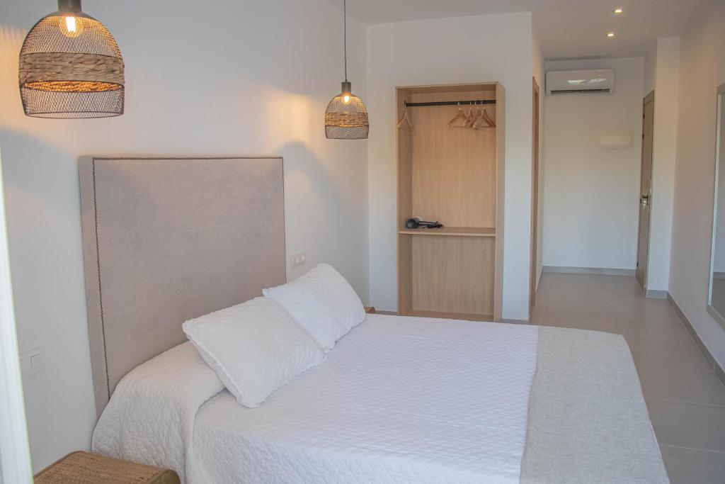 Postel nebo postele na pokoji v ubytování H Arena Mojacar