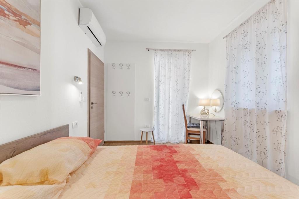 Posteľ alebo postele v izbe v ubytovaní Apartment Mariuccia with Private Pool