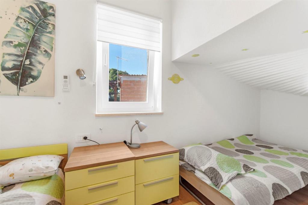 Posteľ alebo postele v izbe v ubytovaní Apartment Mariuccia with Private Pool
