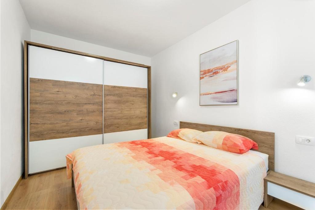 Posteľ alebo postele v izbe v ubytovaní Apartment Mariuccia with Private Pool