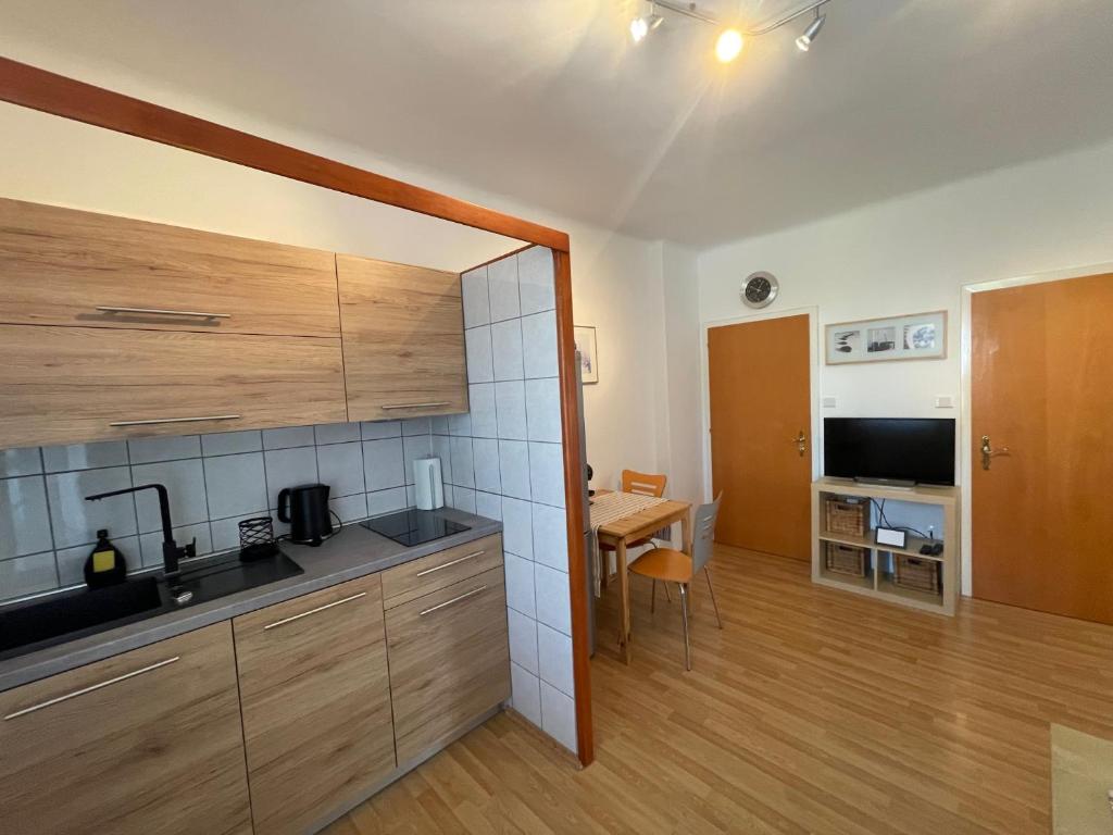 Kuchyň nebo kuchyňský kout v ubytování Apartmaji Iva