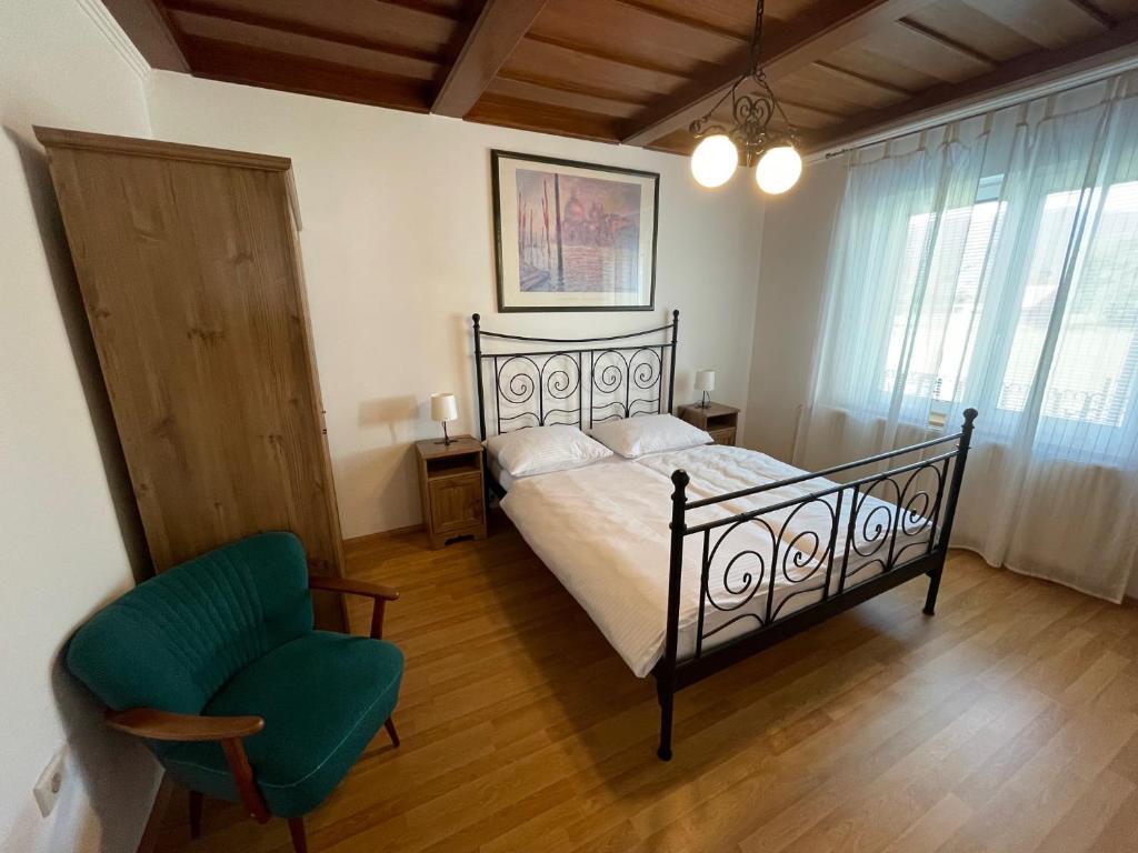 Postel nebo postele na pokoji v ubytování Apartmaji Iva