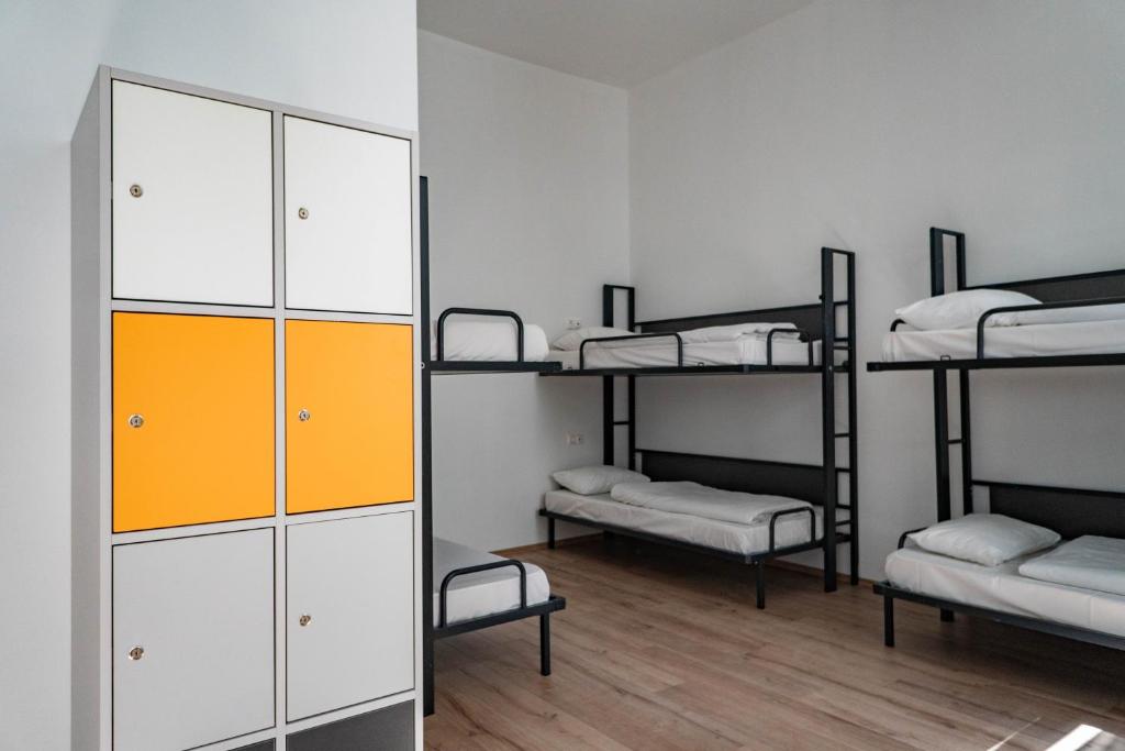 Postel nebo postele na pokoji v ubytování Equity Point Budapest