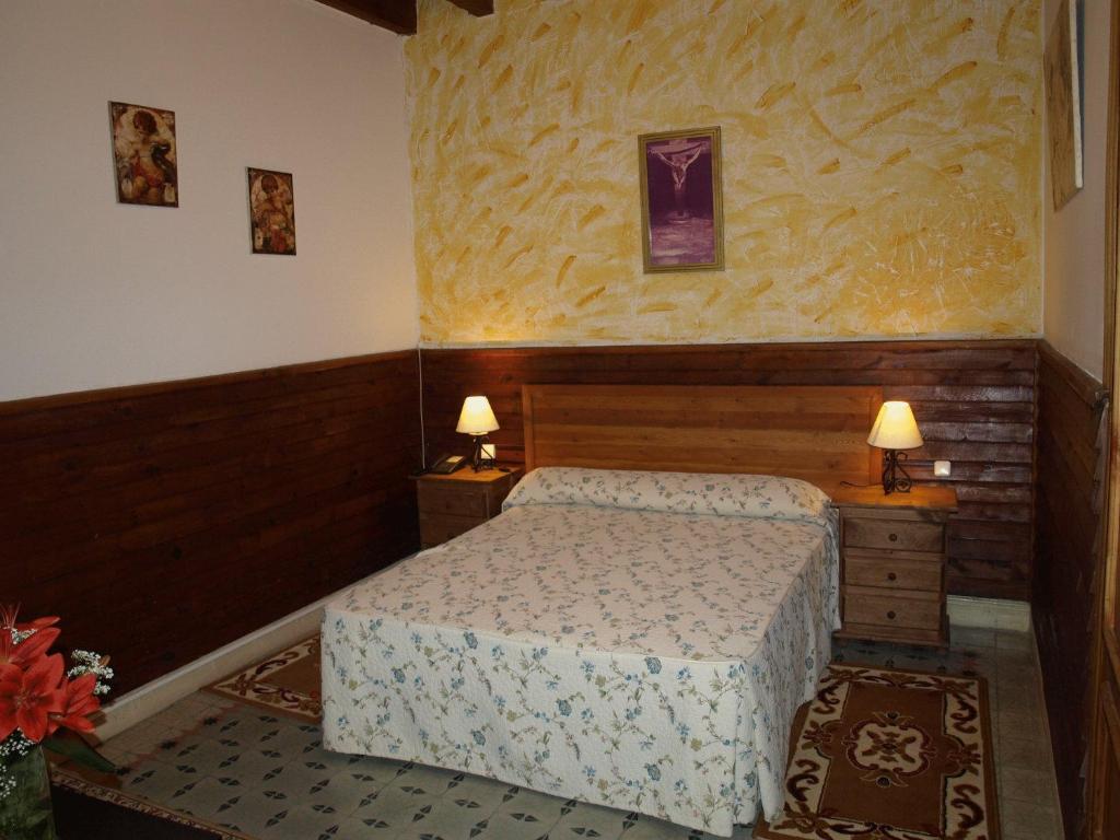 Postel nebo postele na pokoji v ubytování Gran Posada La Mesnada