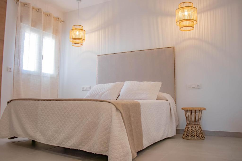 Postel nebo postele na pokoji v ubytování H Arena Mojacar