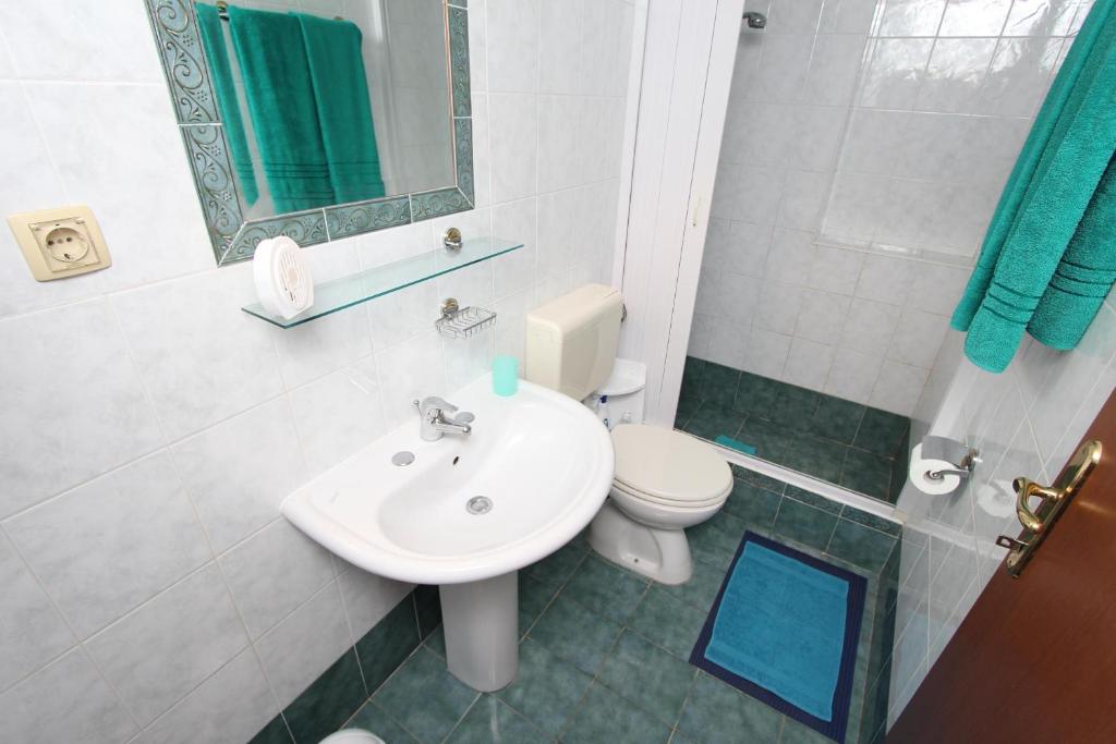 Koupelna v ubytování Apartments Villa Lucu