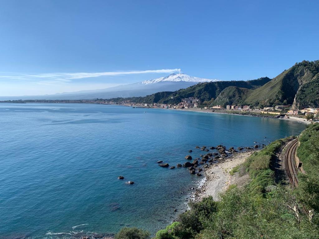 a body of water with a bunch of animals in it at Casa Urbano in Taormina