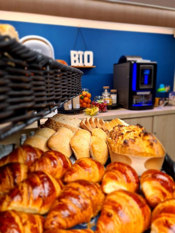 a display of breads and pastries in a bakery at Hôtel Amirauté in Toulon