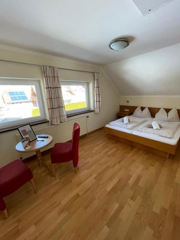 Postel nebo postele na pokoji v ubytování Landhaus Metzgerstubn
