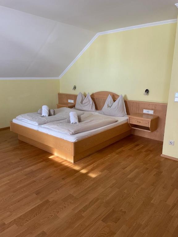 Postel nebo postele na pokoji v ubytování Landhaus Metzgerstubn