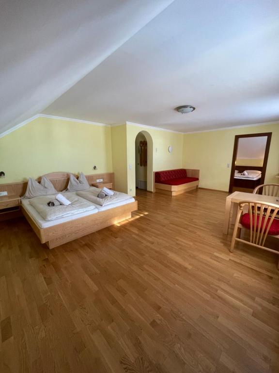 Postel nebo postele na pokoji v ubytování Landhaus Metzgerstubn