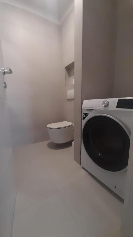 Kúpeľňa v ubytovaní Cozy apartment GALA