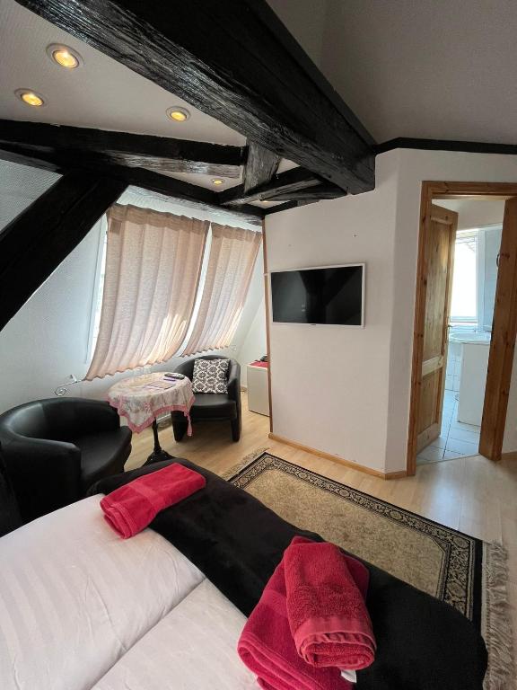 Postel nebo postele na pokoji v ubytování Hotel & Restaurant Sichelschmiede