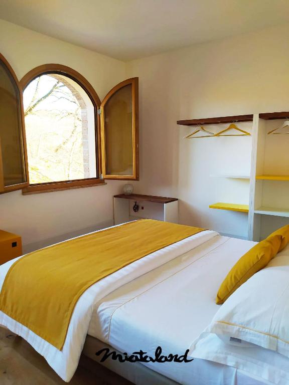 Postel nebo postele na pokoji v ubytování Miataland
