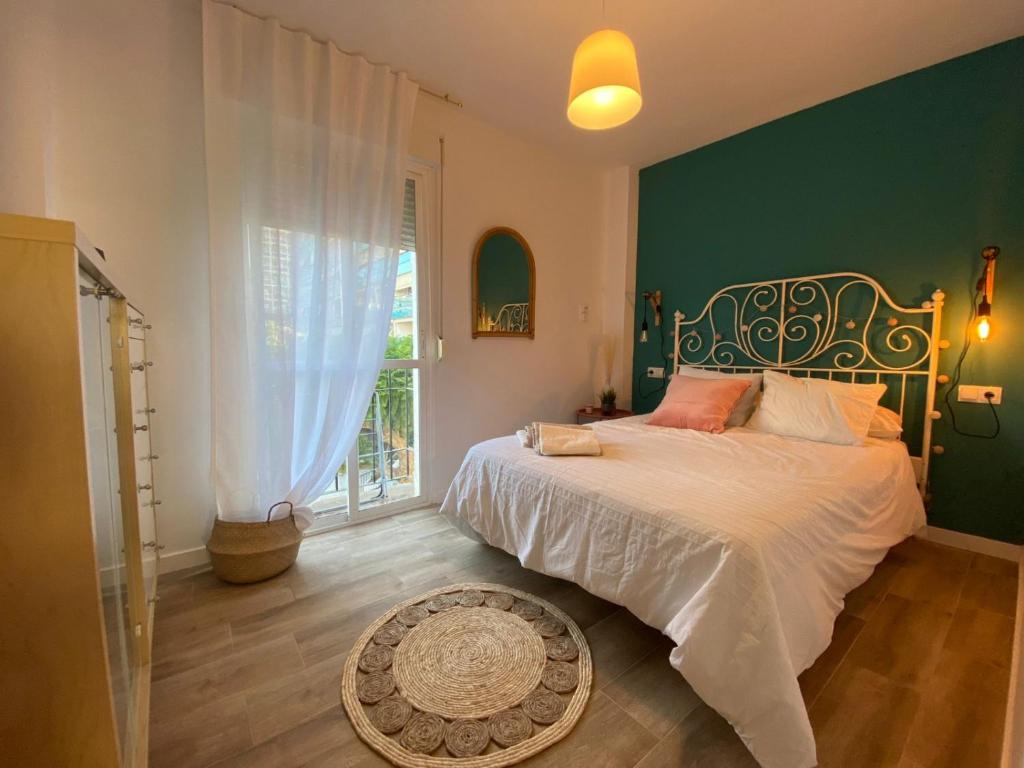 מיטה או מיטות בחדר ב-Benalmádena costa - 100m de la playa - Lecorbusier