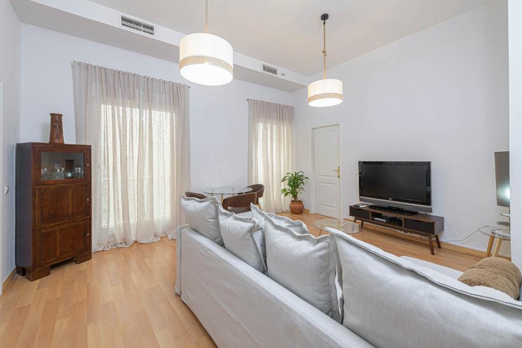 Televízia a/alebo spoločenská miestnosť v ubytovaní WintowinRentals Céntrico, Elegante y Silencioso