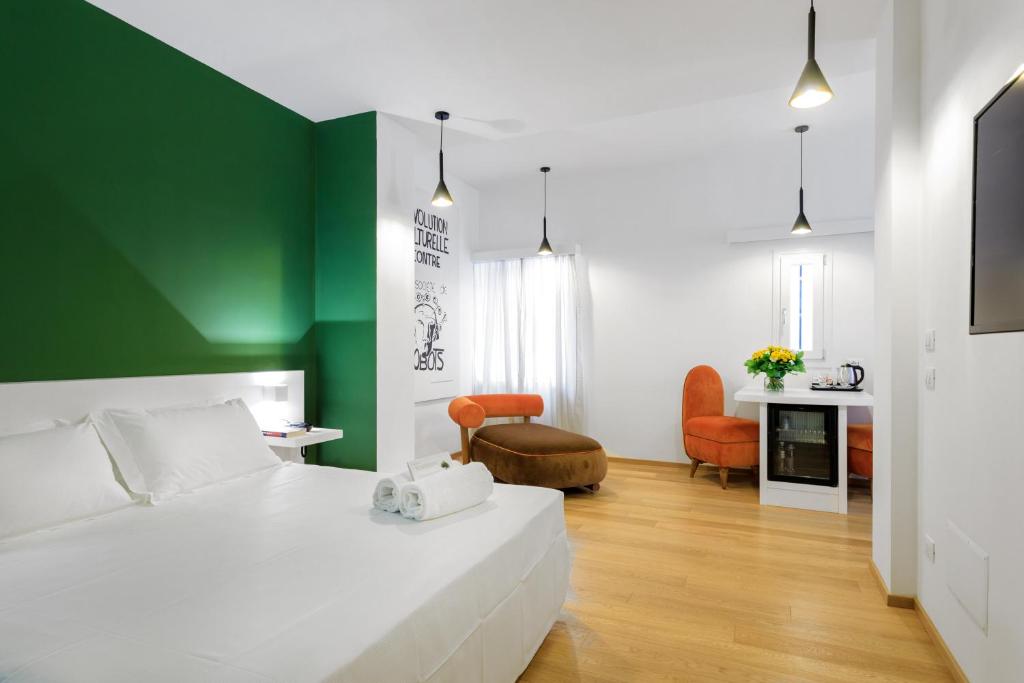 Postel nebo postele na pokoji v ubytování Quintocanto Hotel & Spa