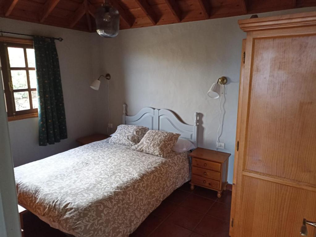 Postel nebo postele na pokoji v ubytování EL PEDRAL