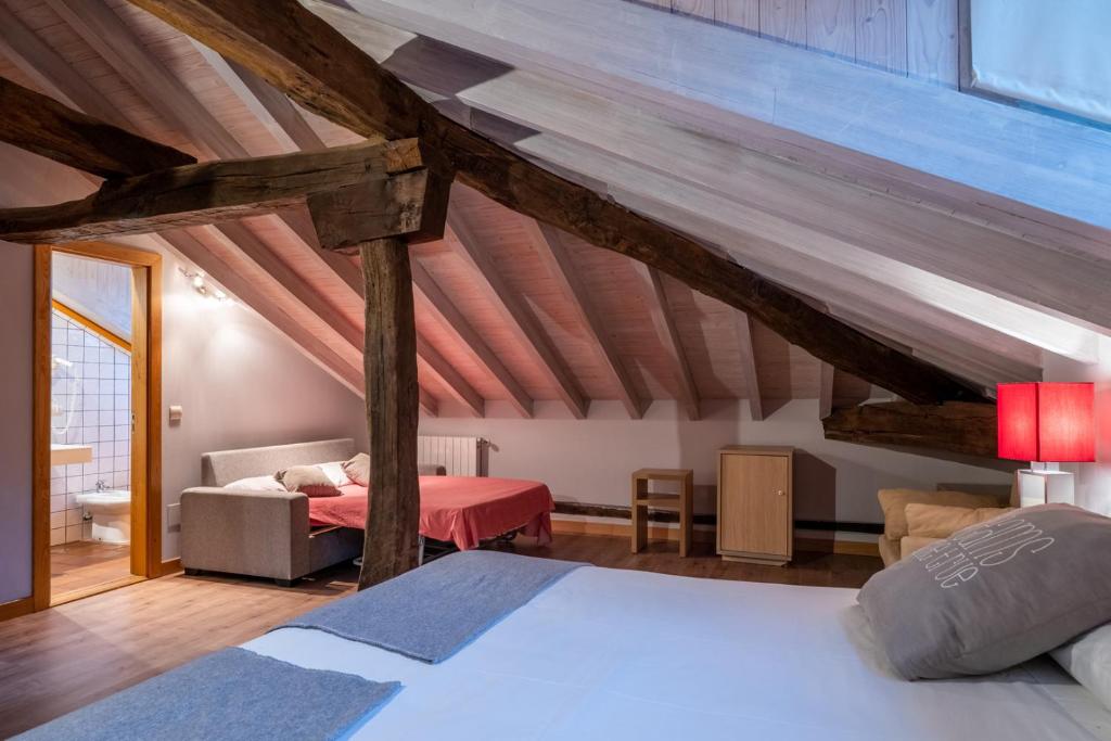 Postel nebo postele na pokoji v ubytování Posada La Robla