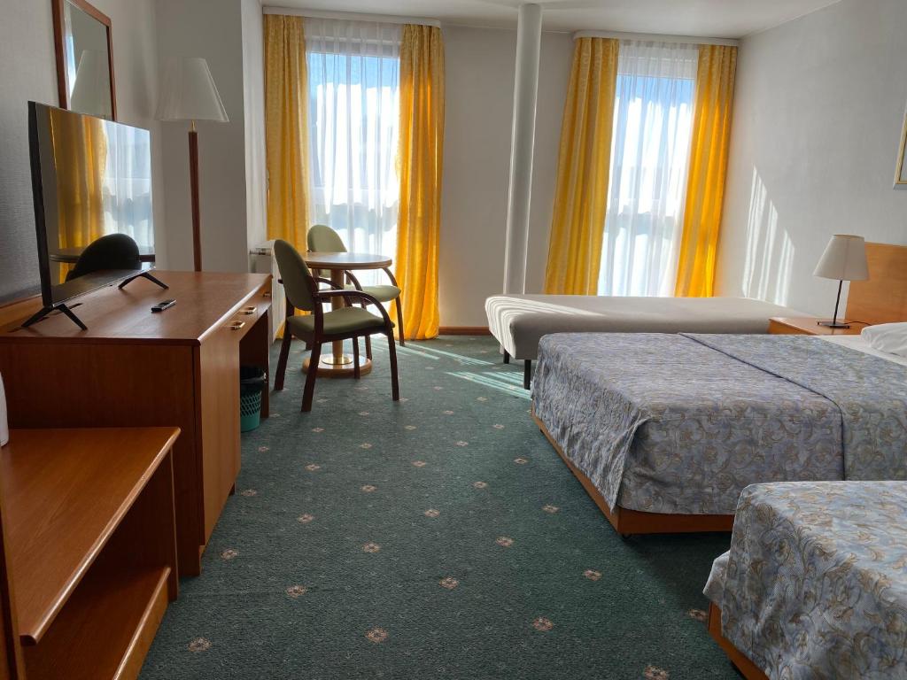 Postel nebo postele na pokoji v ubytování Elekt Czaplinek