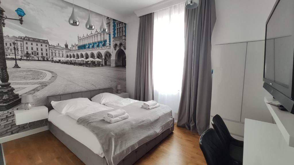 Cama o camas de una habitación en Skawińska 10 by Homeprime