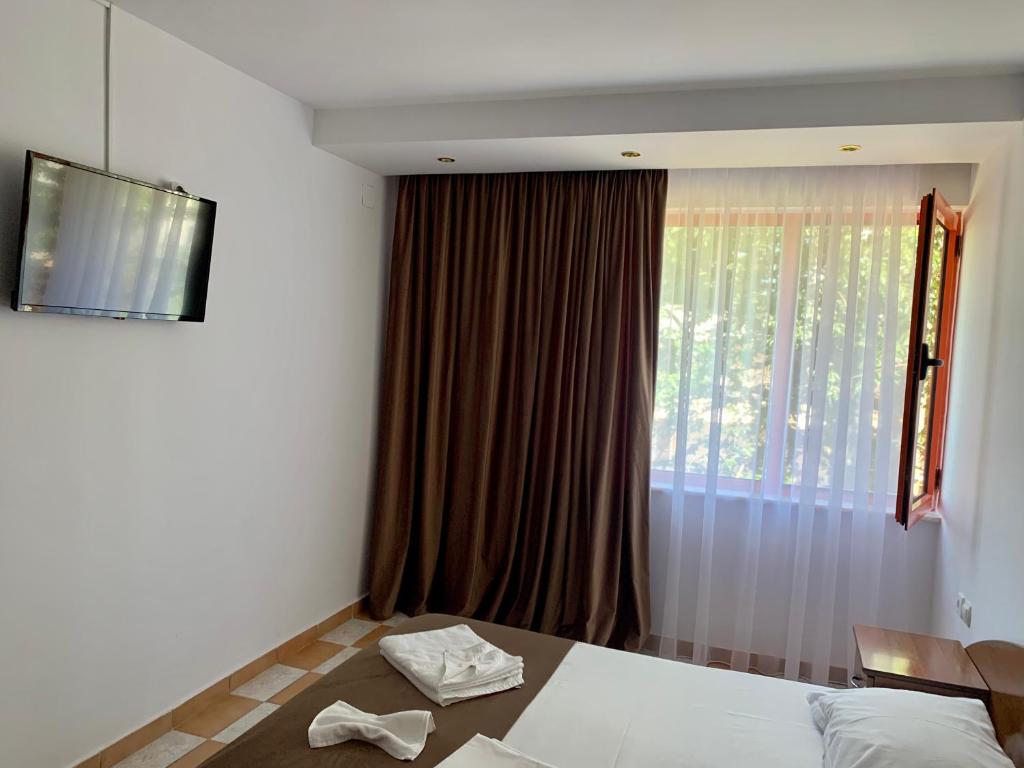 Postel nebo postele na pokoji v ubytování Hotel Nalba-Dalia Jupiter