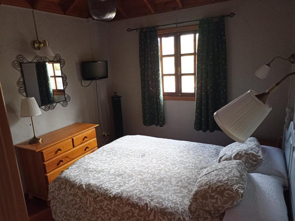 Postel nebo postele na pokoji v ubytování EL PEDRAL