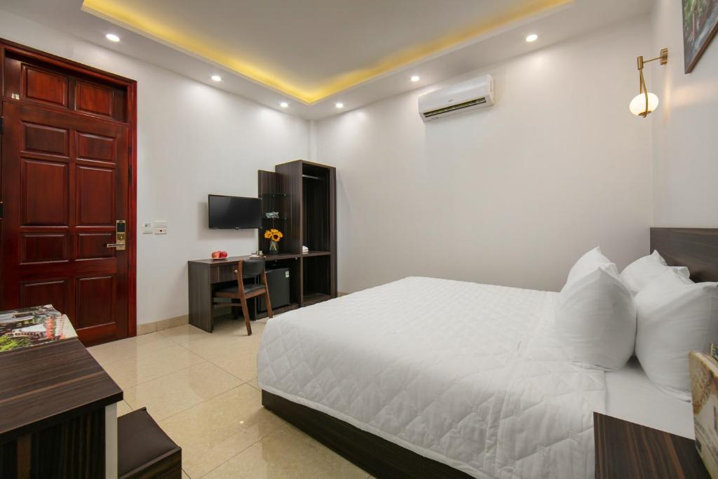 Postel nebo postele na pokoji v ubytování Hanoi Airport Suites Hostel & Travel