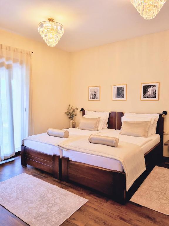 Voodi või voodid majutusasutuse Zrinka House toas