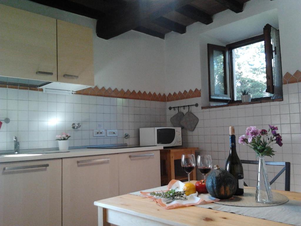 Kuchyň nebo kuchyňský kout v ubytování I Granai