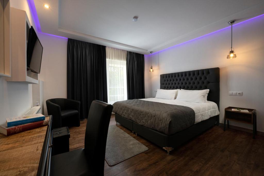 Postel nebo postele na pokoji v ubytování Angelo Spa Resort