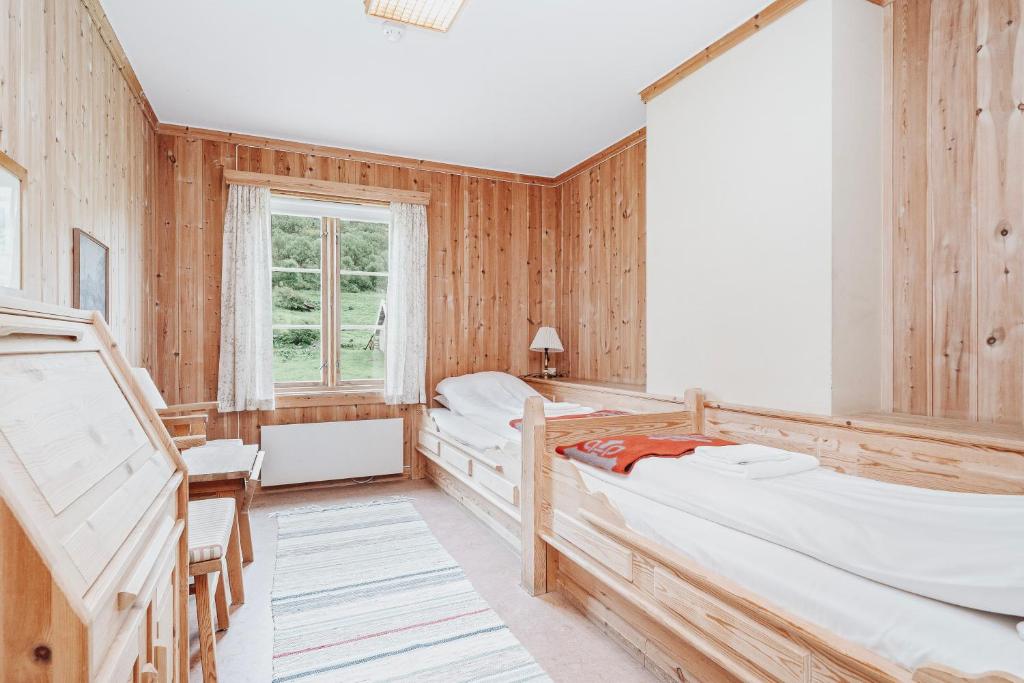 Postel nebo postele na pokoji v ubytování Kongsvold Fjeldstue by Frich`s