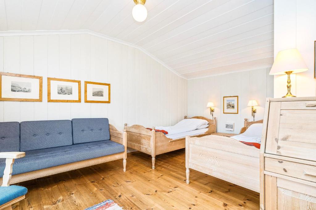 Postel nebo postele na pokoji v ubytování Kongsvold Fjeldstue by Frich`s
