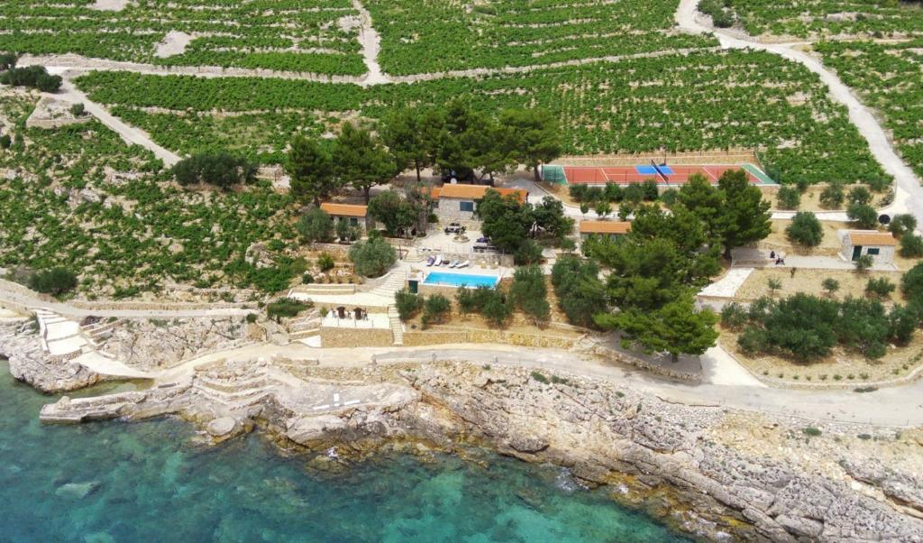 an aerial view of a resort next to the water at Skaramuca Village Luxury Resort in Potomje