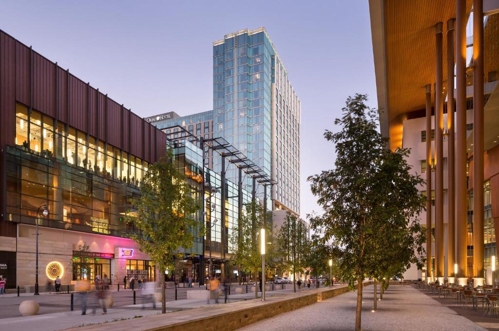 a street in a city with tall buildings at Omni Nashville Hotel in Nashville