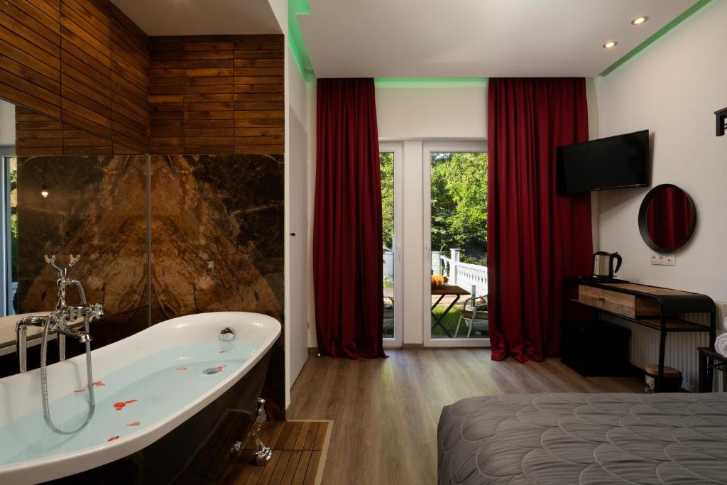 TV a/nebo společenská místnost v ubytování Angelo Spa Resort