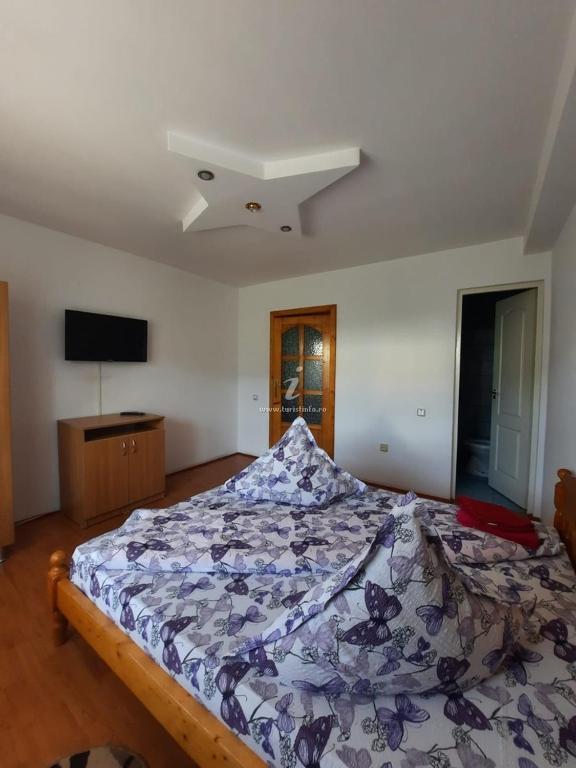 Postel nebo postele na pokoji v ubytování Casa Dany