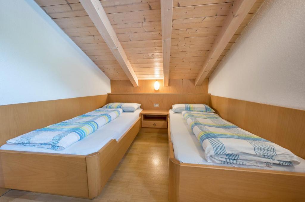 Postel nebo postele na pokoji v ubytování App Sonne Nr 22