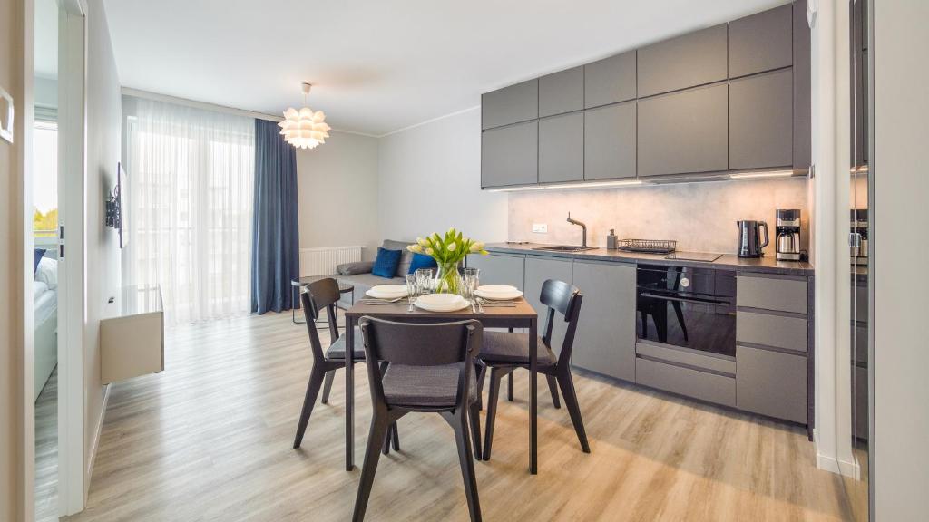 Kuchyňa alebo kuchynka v ubytovaní Prywatne apartamenty Sun & Snow w Porta Mare