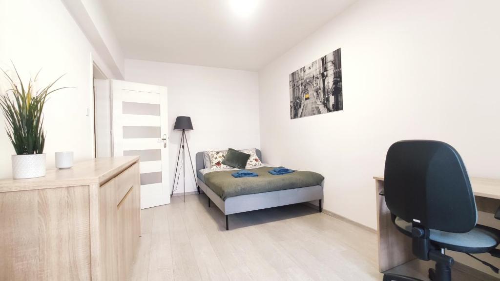 Posteľ alebo postele v izbe v ubytovaní Dąbska 18D by Homeprime