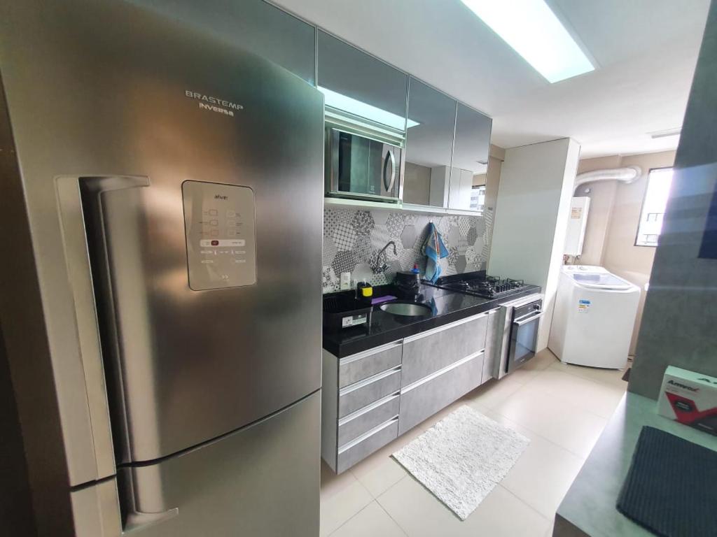 Kuchyň nebo kuchyňský kout v ubytování Apartamentos 250m da Orla -Edifício Nugali- Castelo B Temporada
