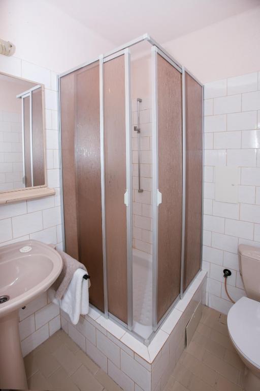 Koupelna v ubytování Hotel-Pension KAMÝK