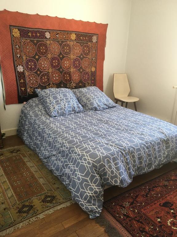 Postel nebo postele na pokoji v ubytování Le Tilleul