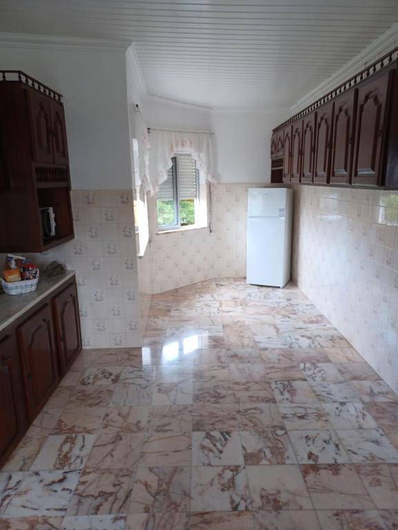 Kuchyň nebo kuchyňský kout v ubytování Casa Brito Aguiar