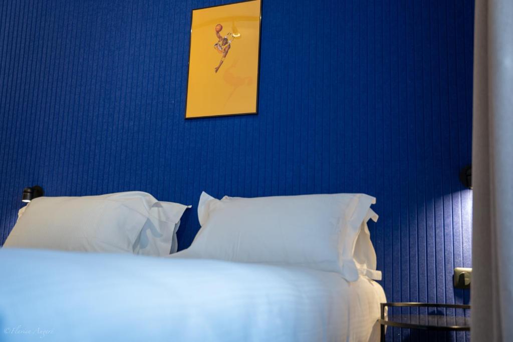 Postel nebo postele na pokoji v ubytování ClapClap Hôtel, Food & Bar